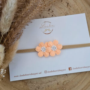 Haarband bloem peach/oranje