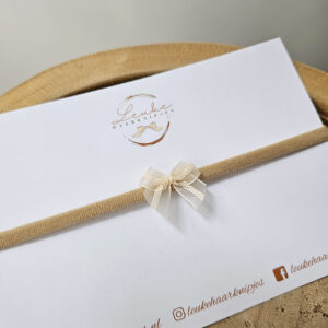 Babyhaarbandje strik beige kantje